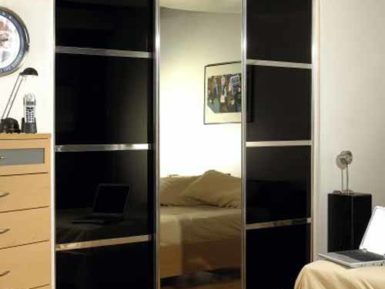 sliding wardrobe mirror and wood